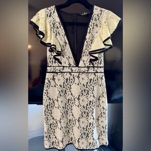 Lulus dress
Size: Smalll
Ivory/Black